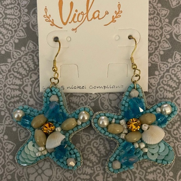 Blue starfish embellished earrings
Seed beads, pearls, jewels, seashells - Picture 2 of 4